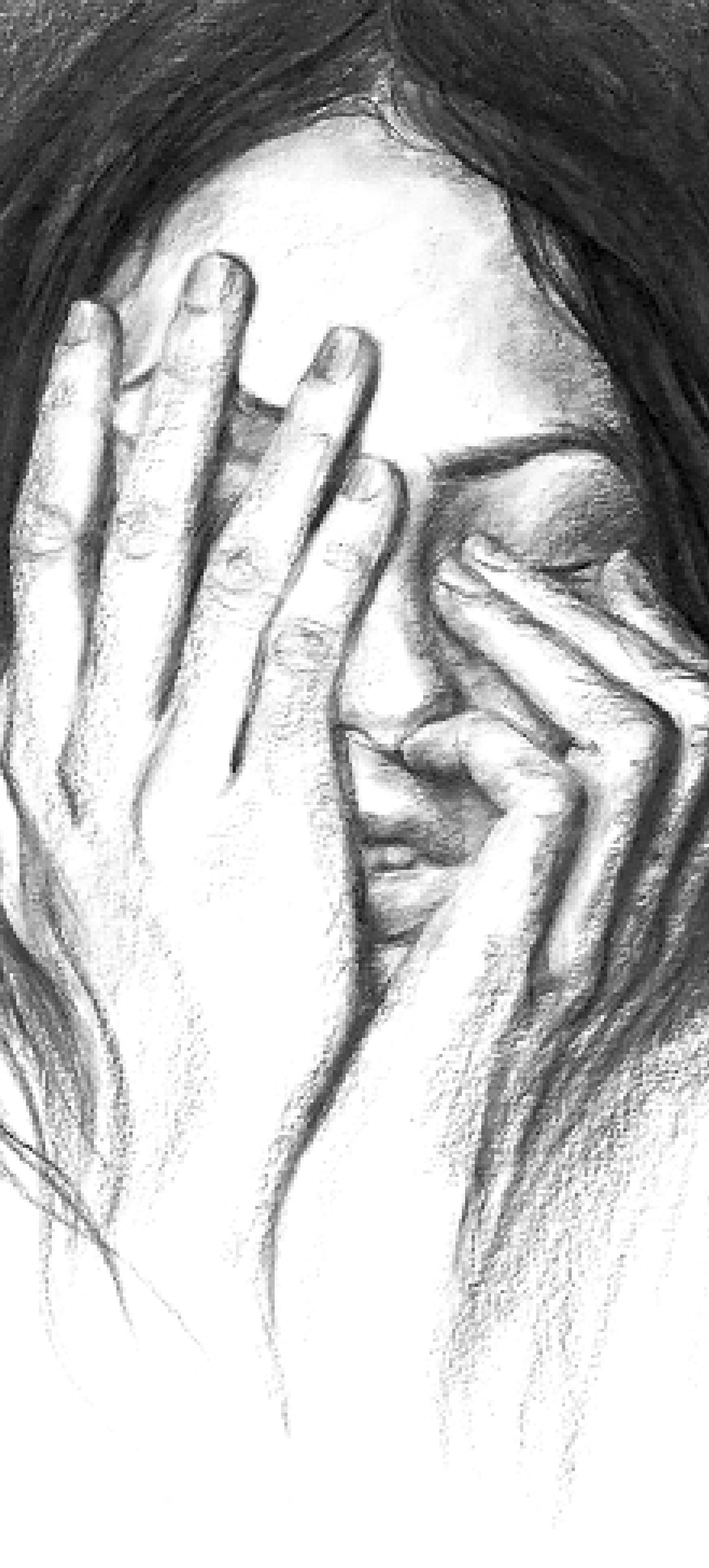 زنی که با دست صورتش را گرفته